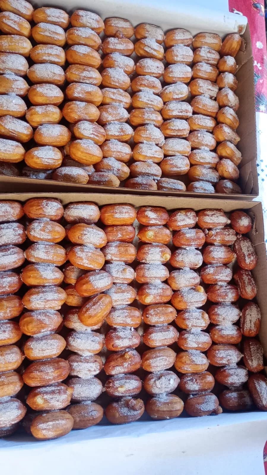 Bandejas de sonhos polvilhados com açúcar
